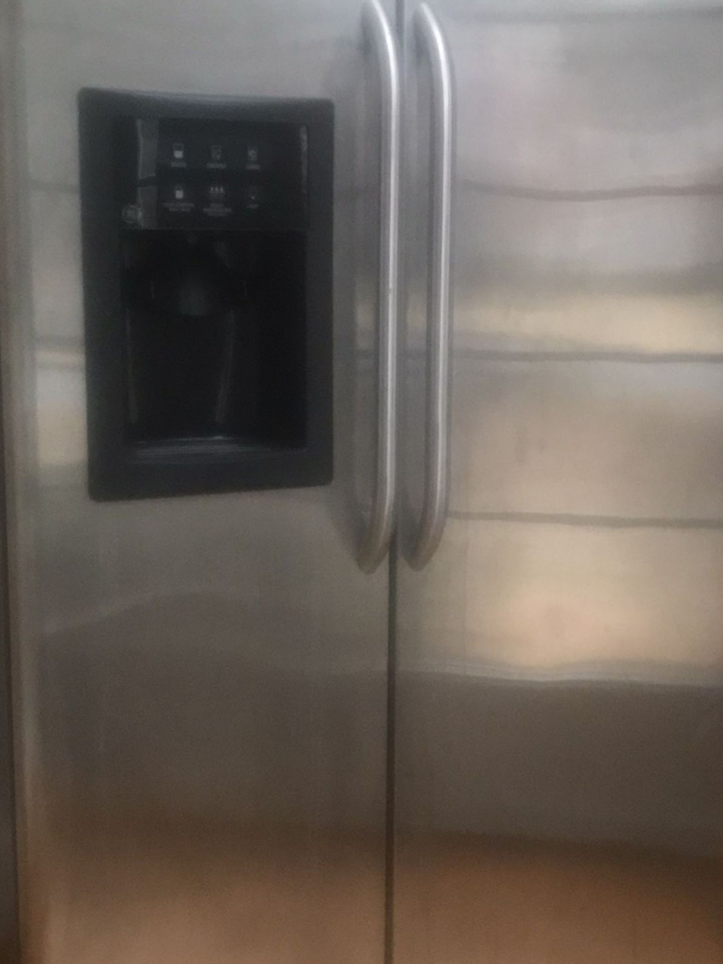 GE Stainless Steel Refrigerator Not Getting Cold $60