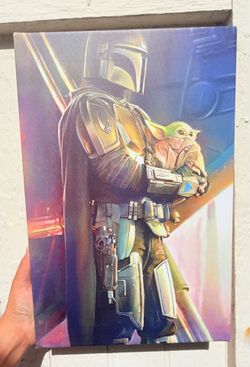 Mandalorian "Held" poster features Din Djarin holding Grogu
