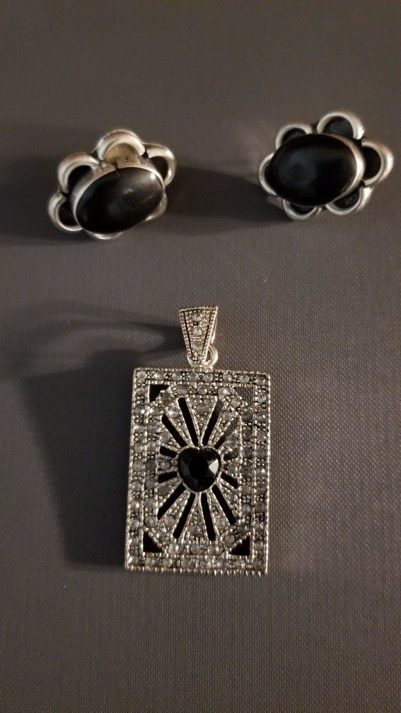 Sterling silver with black onyx and cubic zirconia