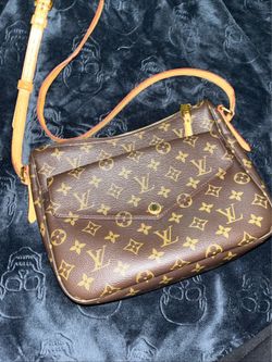 Vuitton Pochette Métis in the classic Monogram