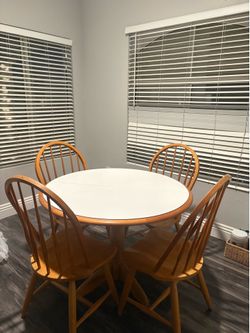 circular wood dining table