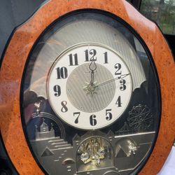 Rhythm Clock With Music And Back Face Opens And Spins