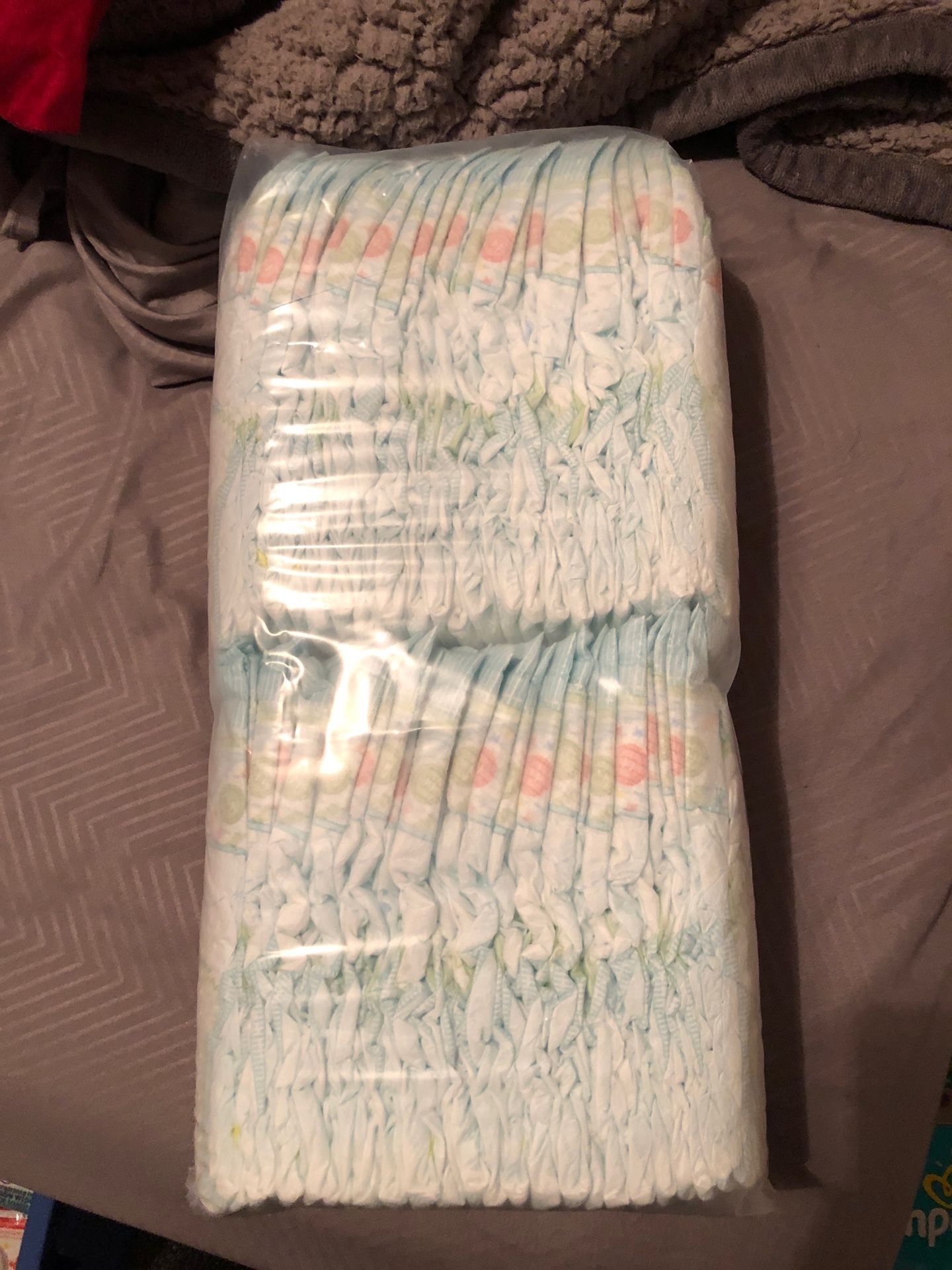 1 sleeve of pampers diapers - unopened