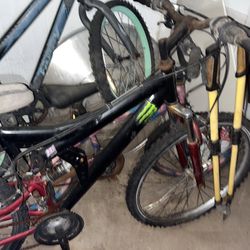 Four Different Mountain Bikes & Kids Bicycles