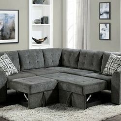 Lanning Gray 3 Piece Sectional with Pull out Bed and Ottoman 


