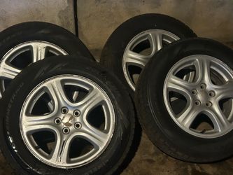 Four Subaru 16 inch 5x100 wheels