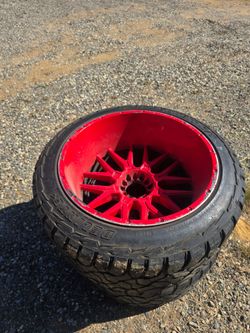 24" inch tires with red rims