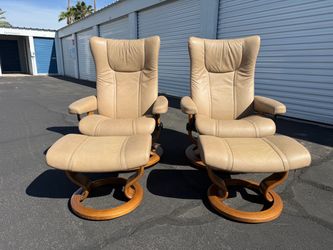 Pair of Ekornes Stressless Wing Recliners and Ottomans.  Copenhagen