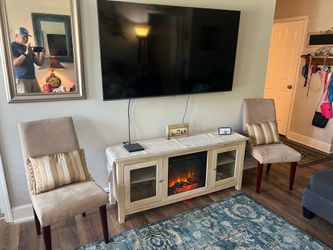 2 Beige Suede Accent Chairs With Pillows. No stains or worn areas