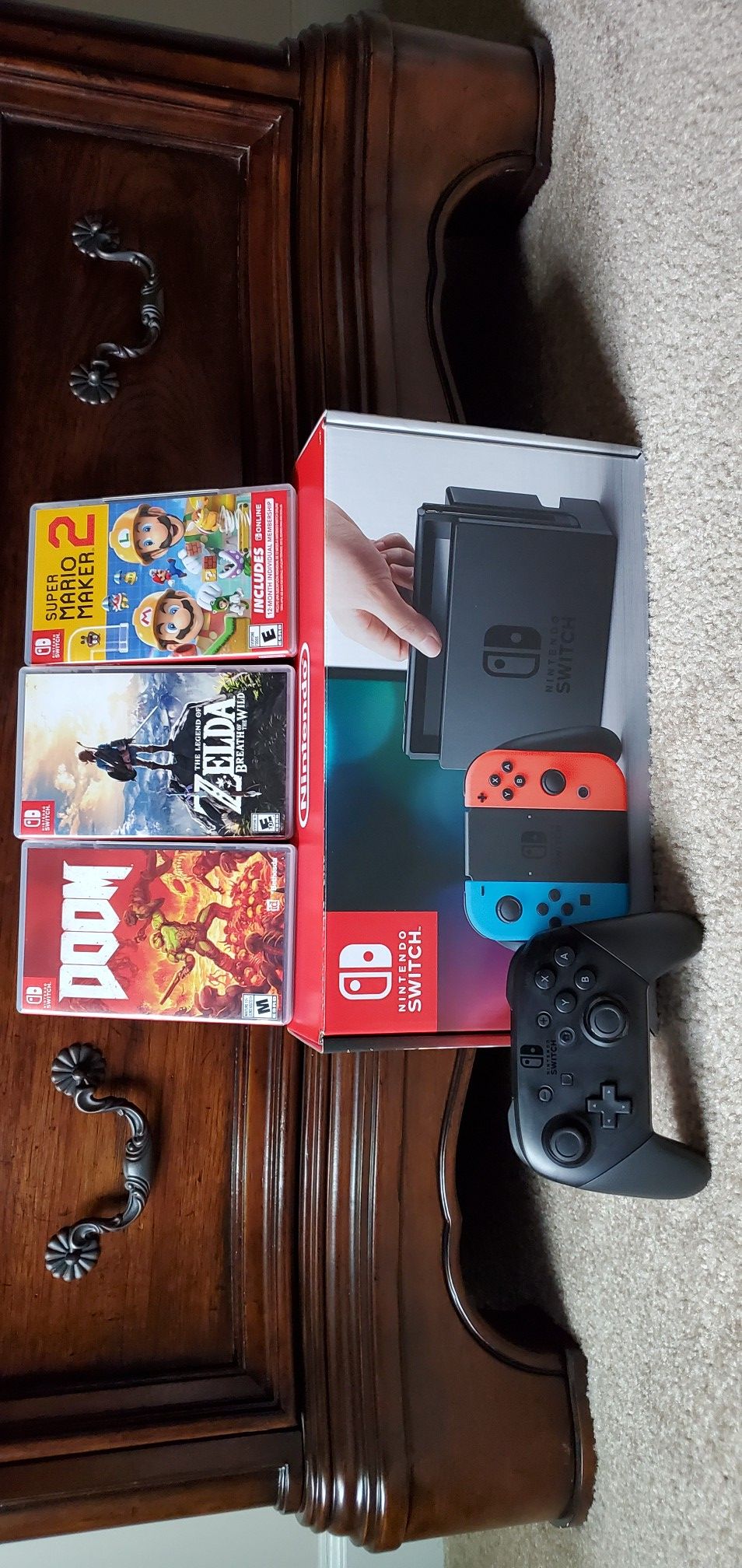 Nintendo Switch with 3 games and Pro Controller