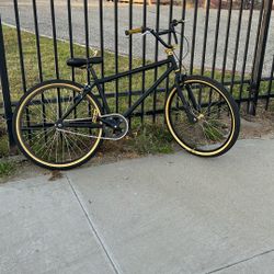 26 in black and gold custom bike