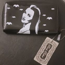 "Elvira "Wallets