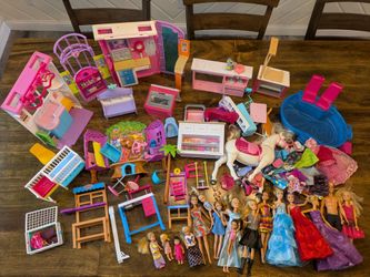 Large lot of Barbies and accessories