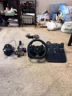 Logitech g923 racing simulator with pedals, shifter, and e-brake