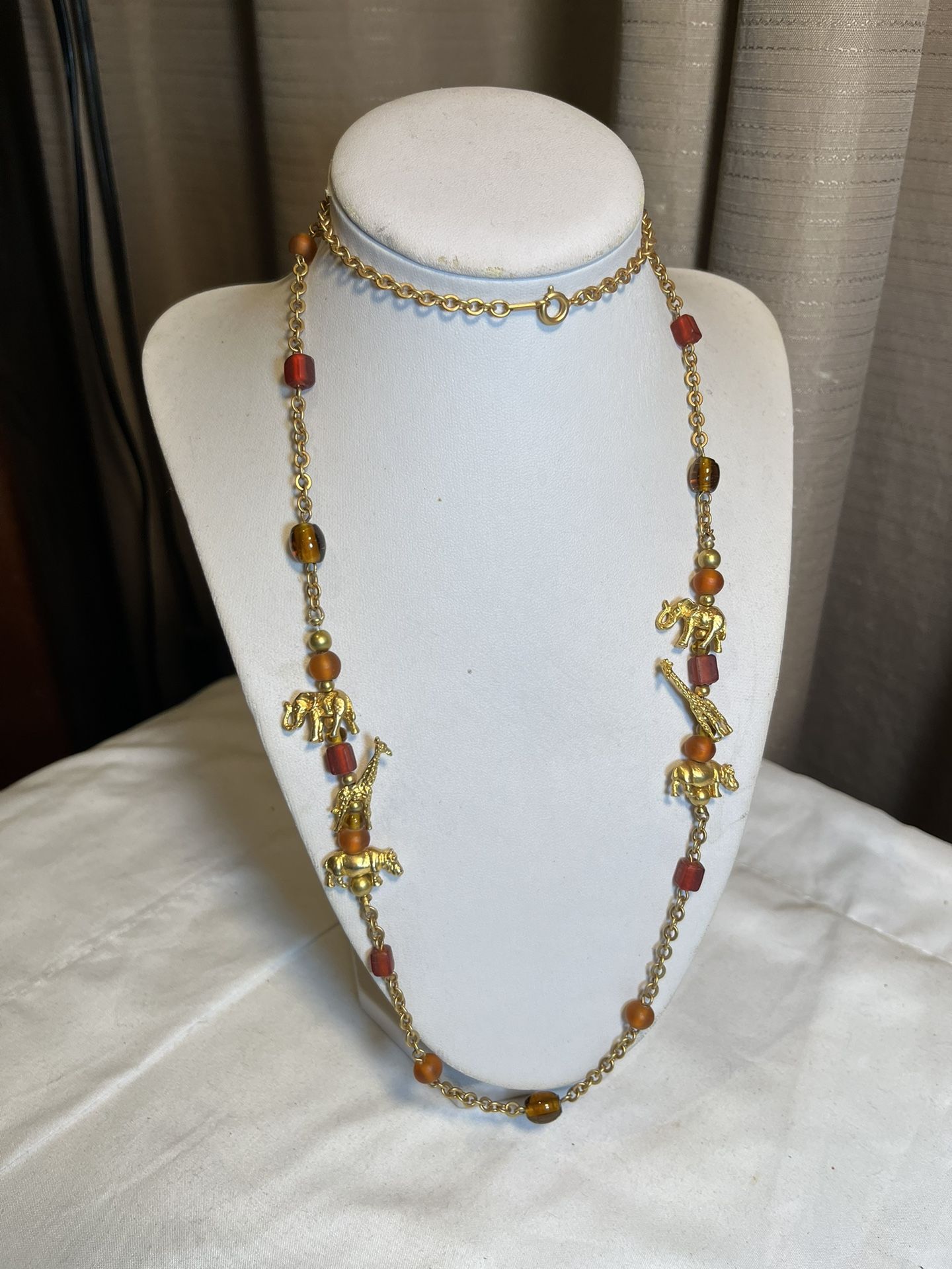 Gold Tone Chain, Glass Beads And African Animals Necklace