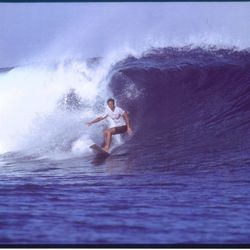 Surfboards And Prolite Travel Bags
