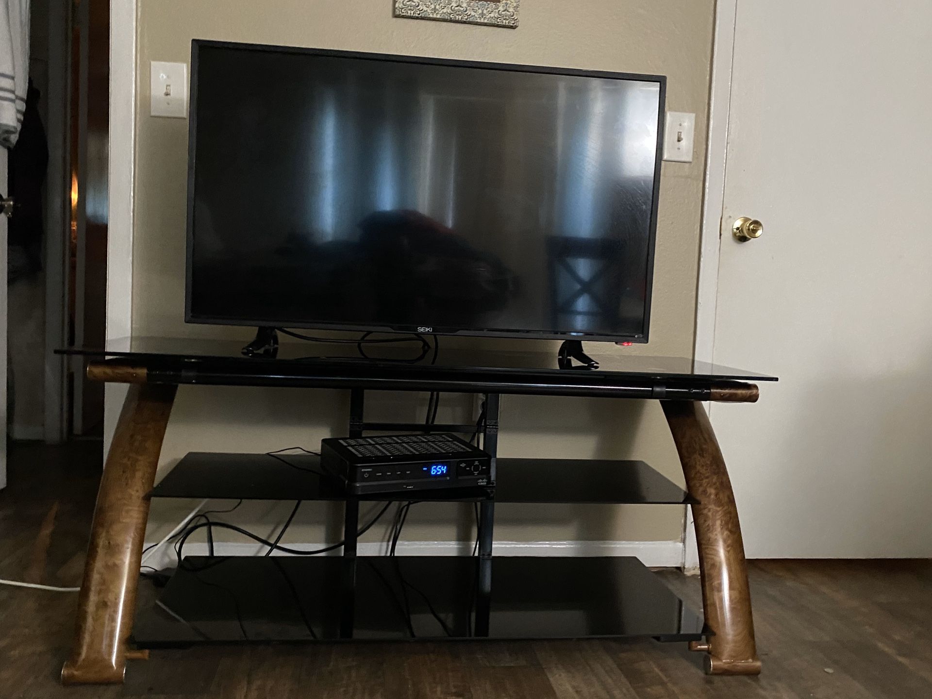 Glass Tv stand , offer me a price