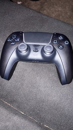 Sony PS5 DualSense Wireless Controller Black and console with another red controller