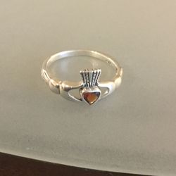 Sterling silver Claddagh ring with garnet