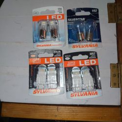 Brand New Headlight Bulbs Four Different Styles 2 LED Two Regular