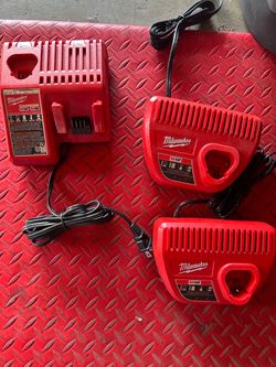 Three chargers. Two for M12 batteries and one charger that charges every Milwaukee battery.