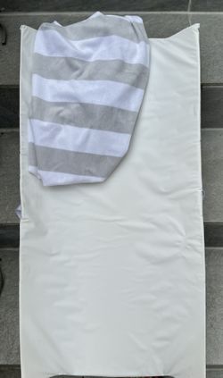 Munchkin Secure Grip Baby Diaper Changing Pad for Dresser, Waterproof and Wipeable, Contoured