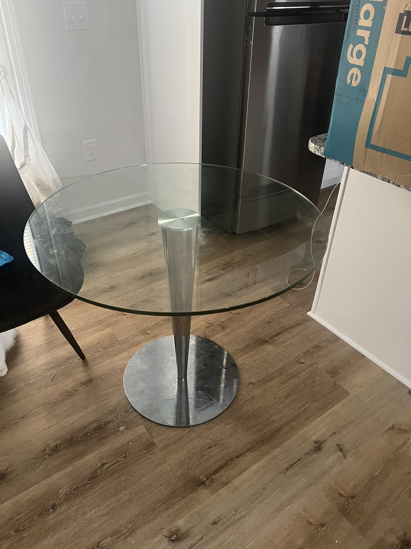 Round Glass Dining Table with Chrome Pedestal Base - Modern & Minimalist
