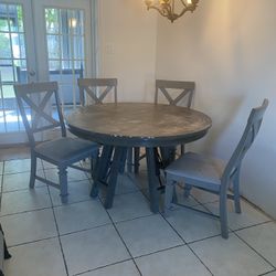 Round Dining Table And Chairs