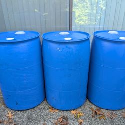 Three 50-gallon Rain Barrels Or Drums