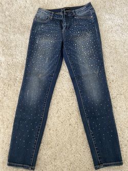 Bebe Size 4 women’s rhinestone jeans
