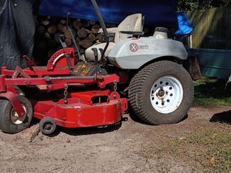 Exmark zero turn mower brand new motor light brand new cuts great