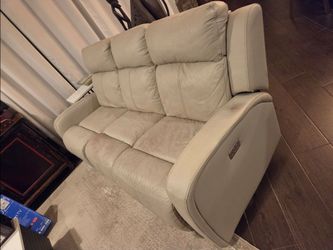 FREE leather sofa with dual powered recliners