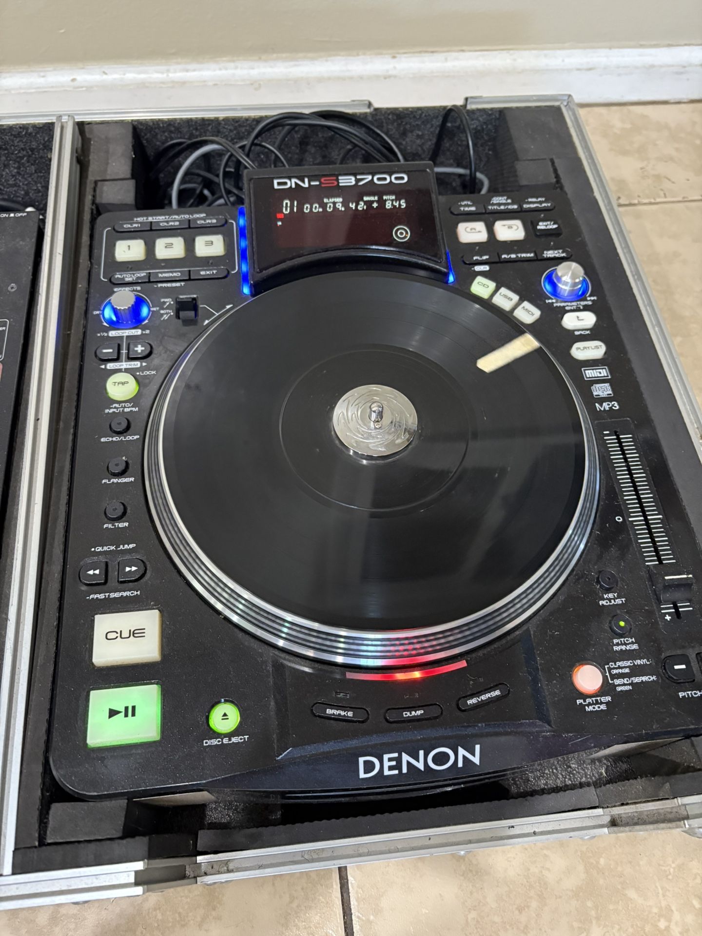 DJ setup consisting of two Denon DN S3700 digital turntables and a
