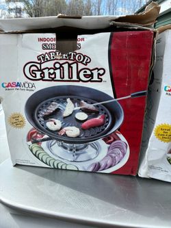 New in box. Table top griller