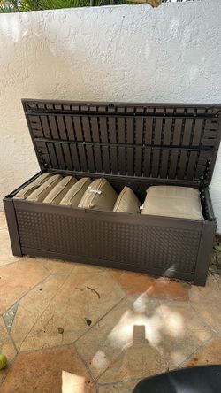 2 brown outdoor containers
