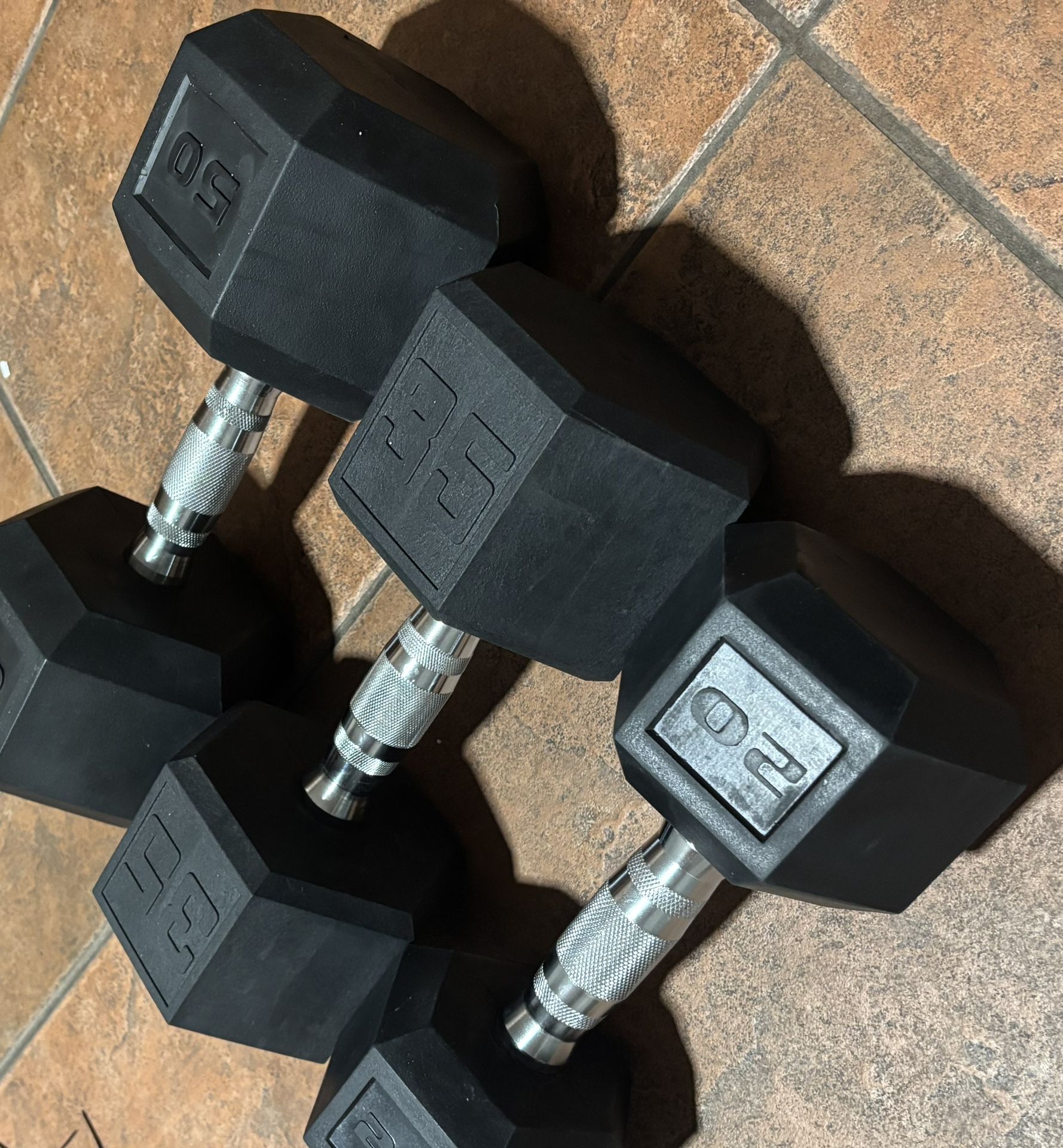 20, 35, and 50LB dumbbells