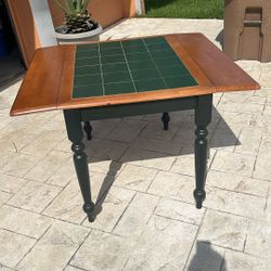 Table with double sided fold up leafs