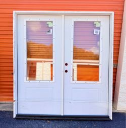 New patio double door system. Right hand outswing, pre-hung continuous sill unit. Each door slab 35-3/4 inches wide by 79 inches tall, 1-3/4 inch thic