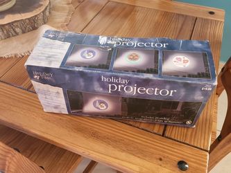 Holiday time 25 seasonal projector with discs