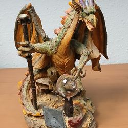 Large Fantasy Dragon Statue Holding a staff and glowing orb