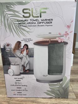 Towel warmer with aroma diffuser