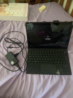 Microsoft Pro 7 touch screen tablet with charger and Keith