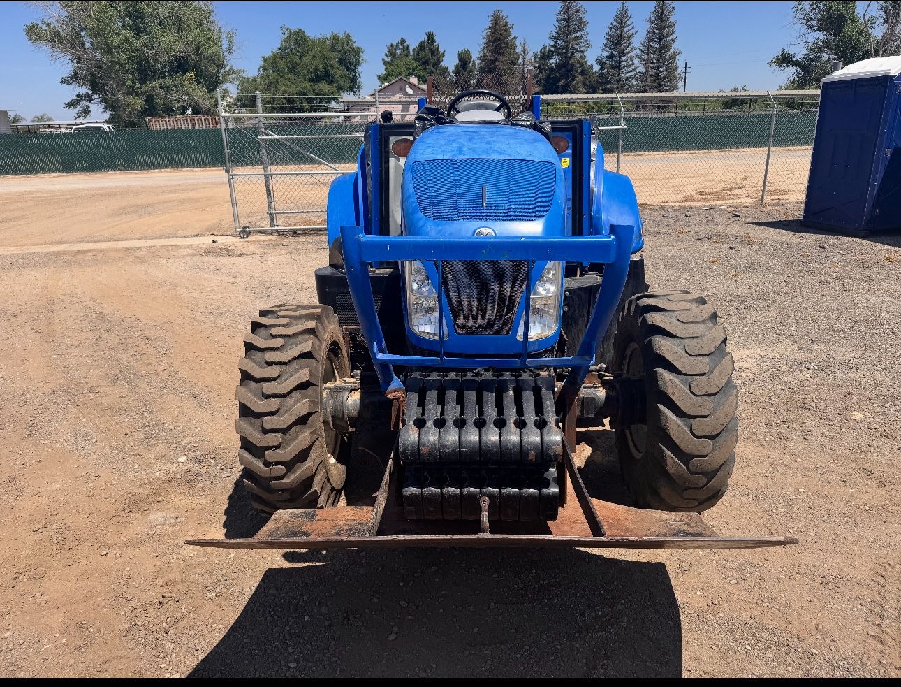 New Holland Tractor With Shredder