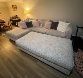 Oversized Modular Gray Sectional with Matching Ottoman – Only 1 Year Older