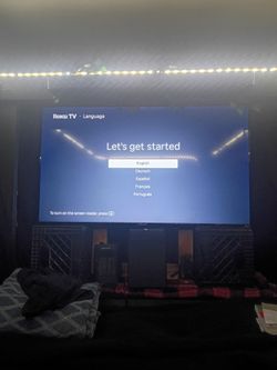 Slightly used 55 inch roku tv and insignea sound bar and bass box