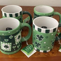 4 Shamrock St. Patrick’s Day coffee, tea, milk mugs.  Little bears inside each mug. New with tags.