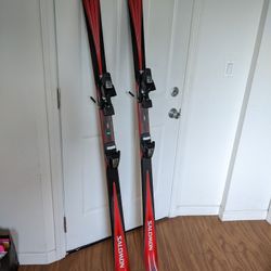 Salmon skis with binding, 66", very new.
