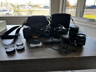 Nikon D5300 And Canon EOS Rebel XSI With Accessories