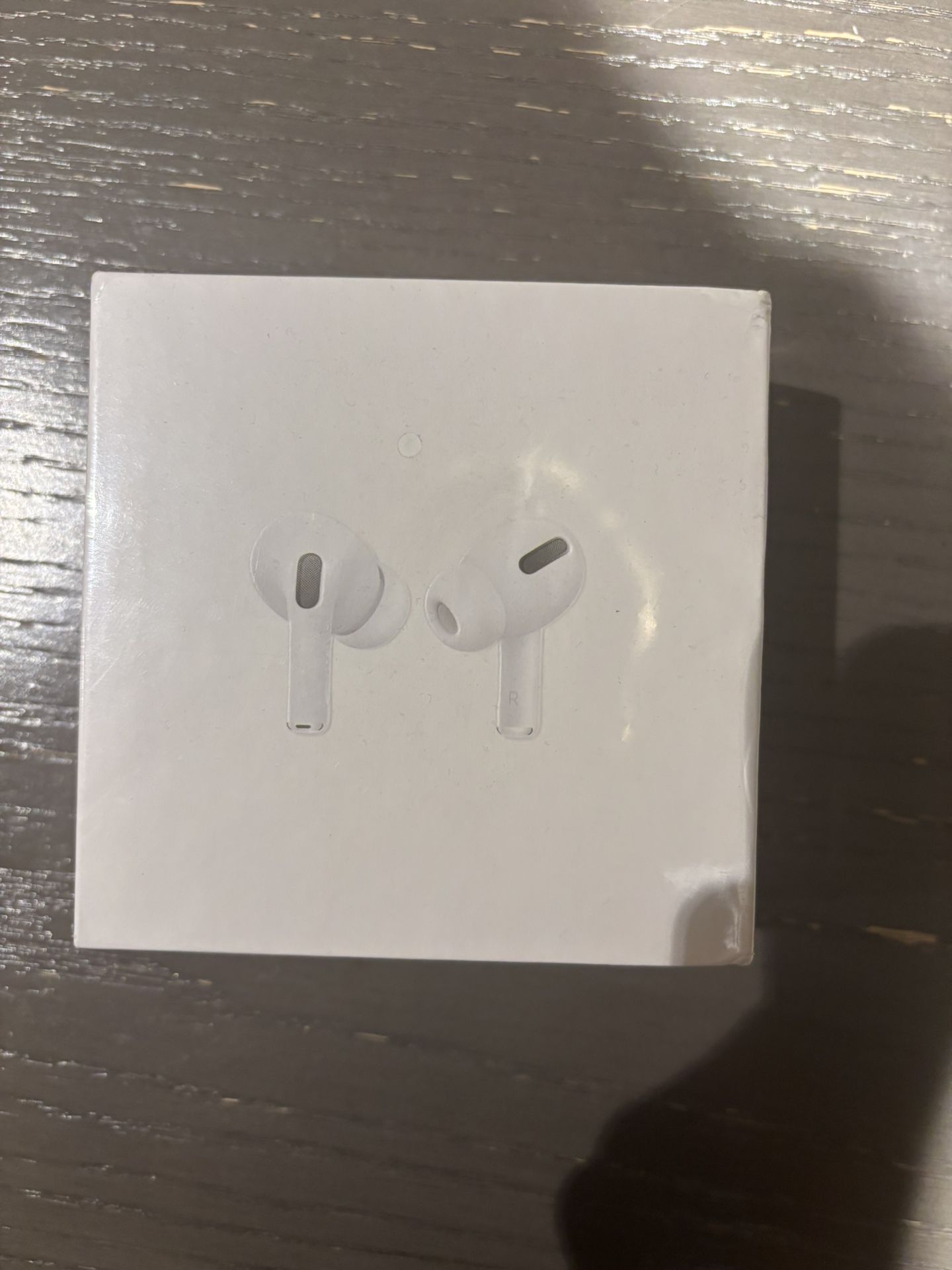 Wireless ear buds sealed in box