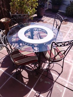 Wrought iron & glasses patio table set
